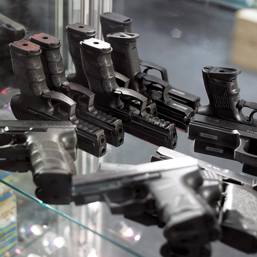 Pistols on display table